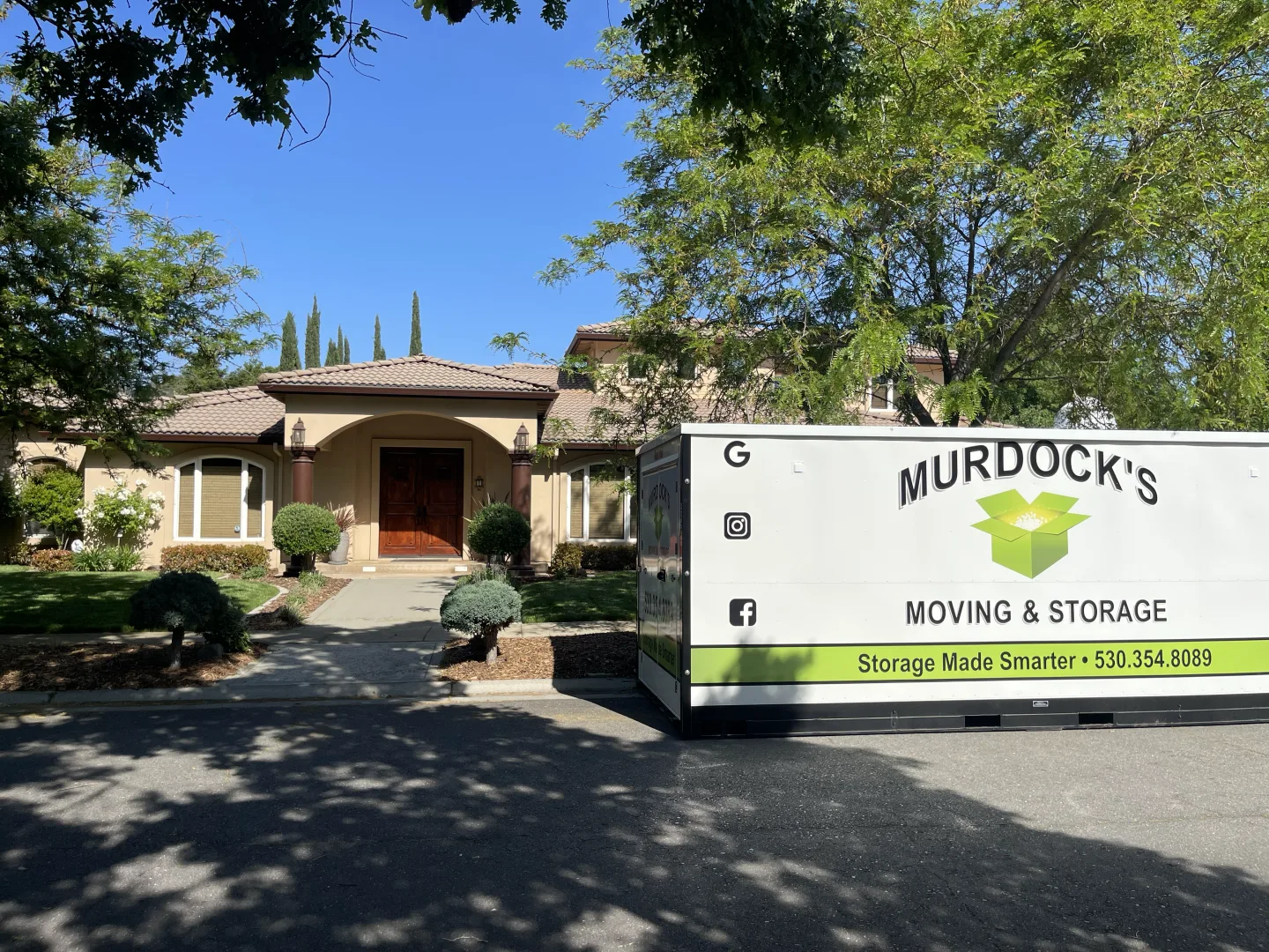 A MODS container set on a residential driveway for load-at-your-own-pace access.