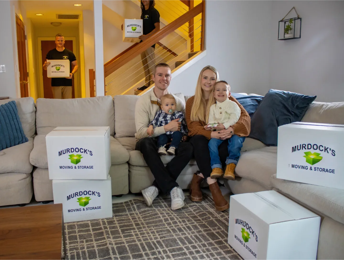Murdock’s moving truck and crew welcoming a family home after their move