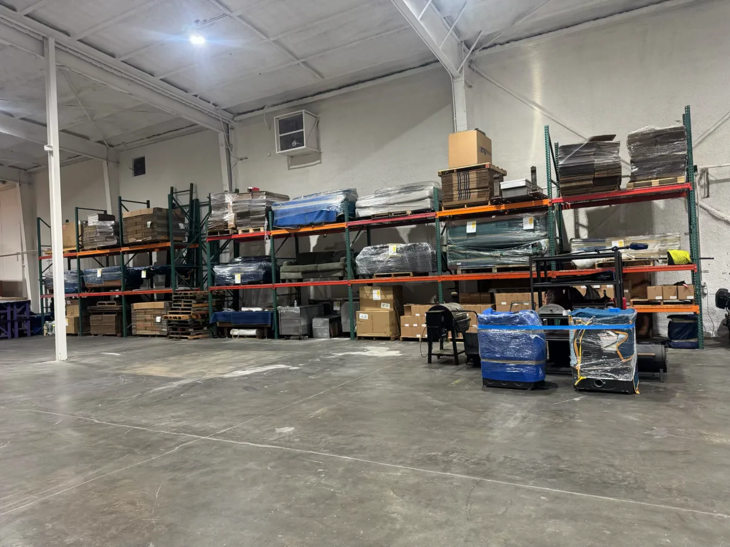 Racked, inventoried belongings inside a staffed Murdock’s warehouse.