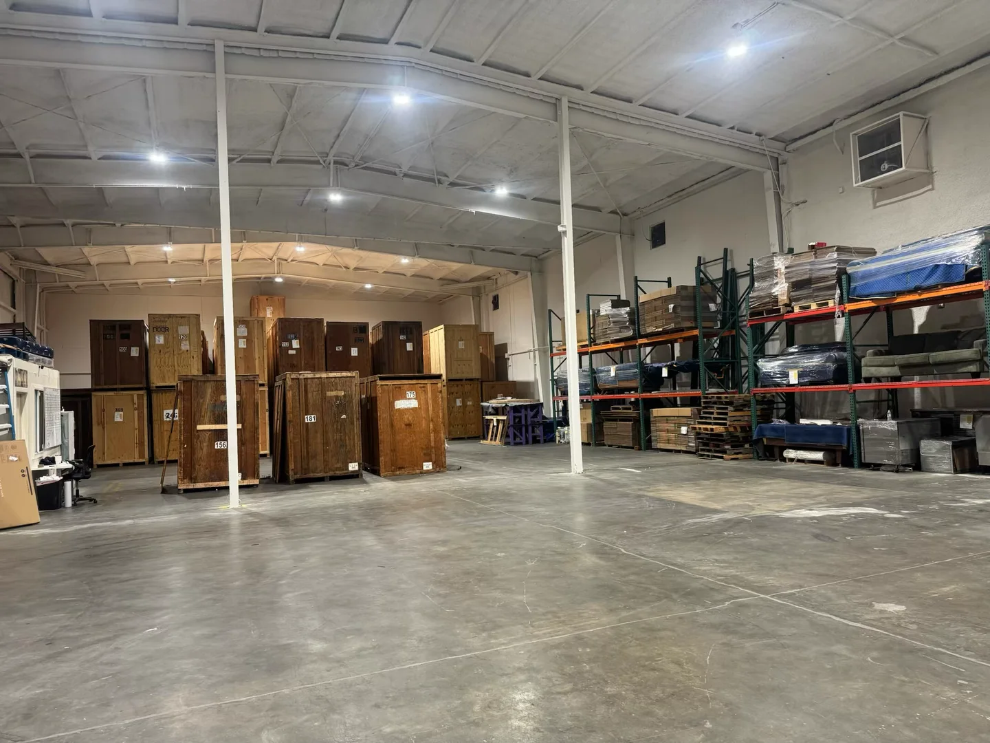 Wood storage vaults keep each household’s load contained and tracked.